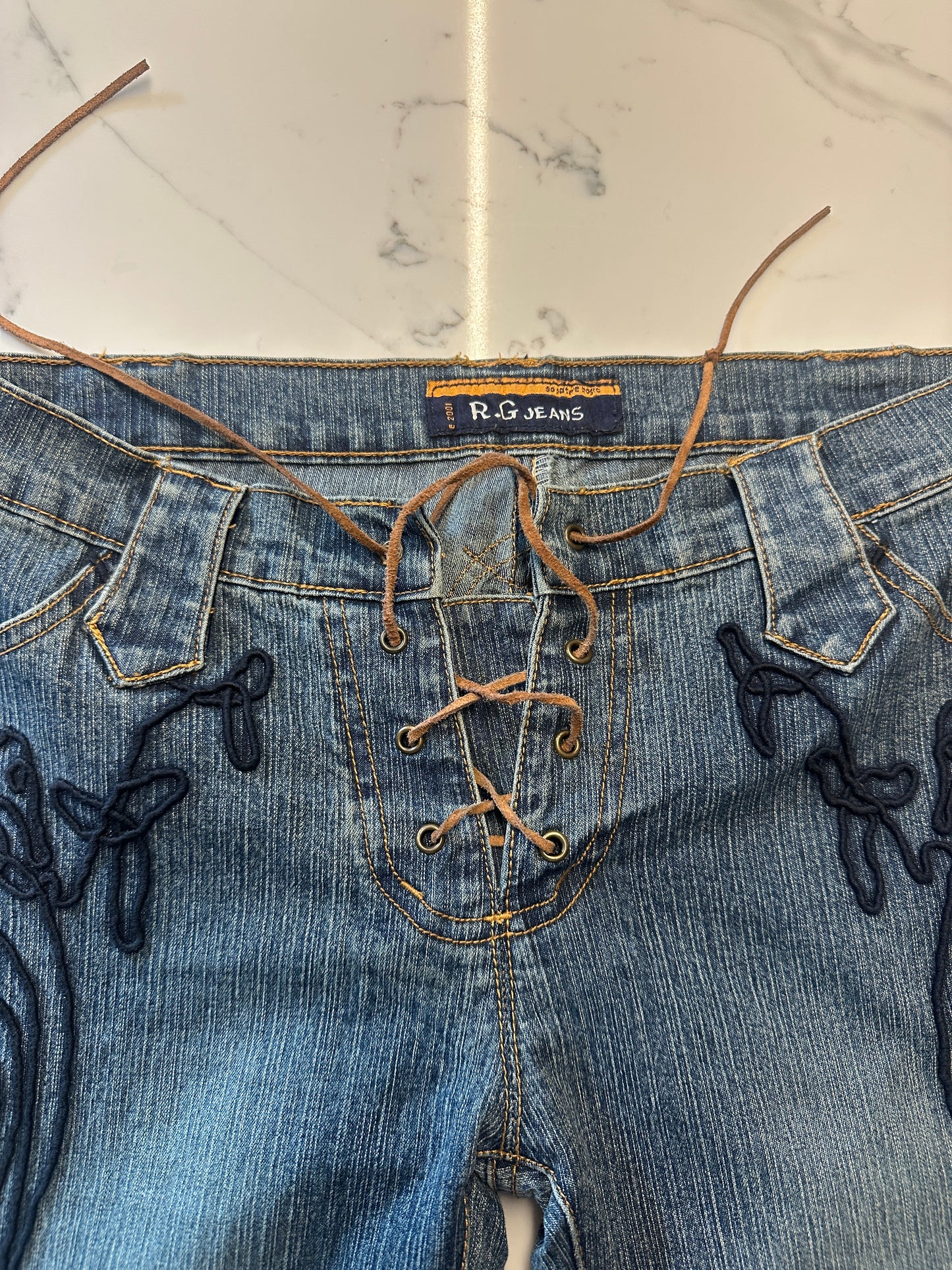 Lace Up Low Rise Bootcut Jeans